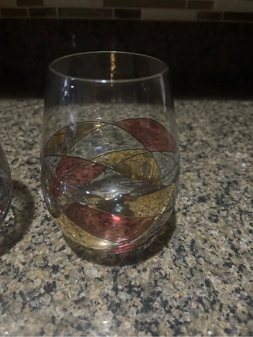 Cornet Barcelona Stemless Wine Glasses with Gold and Pink Swirl Accents